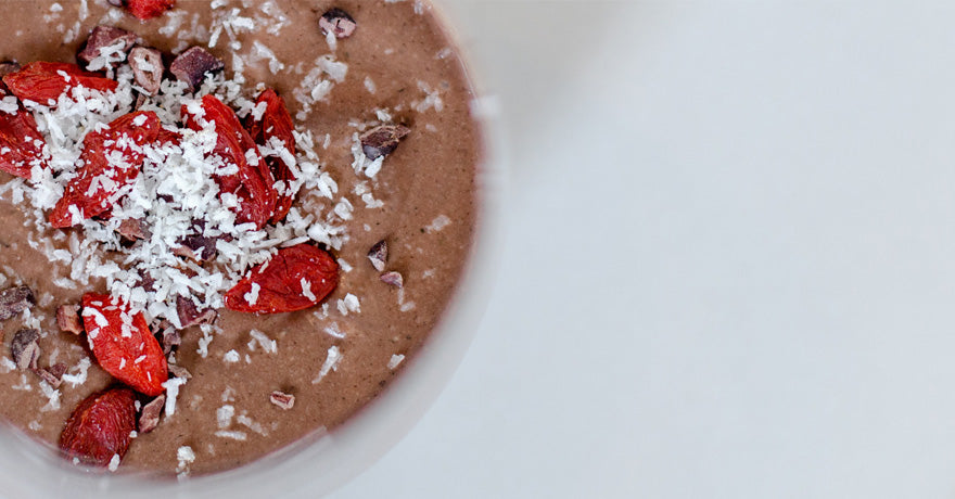Chocolate pudding with goji berries and cocao nibs on top