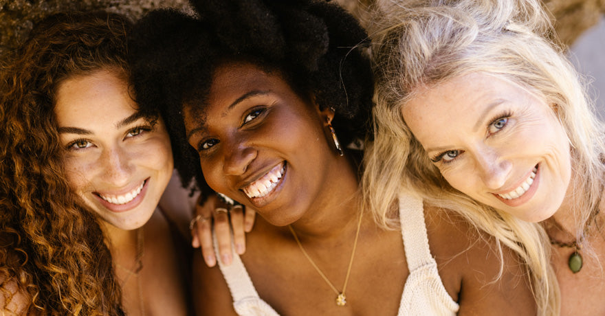 diverse group of women of different ages smiling