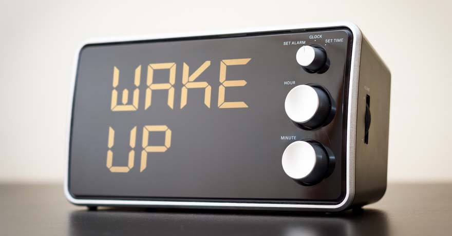 Alarm clock with display "Wake Up"
