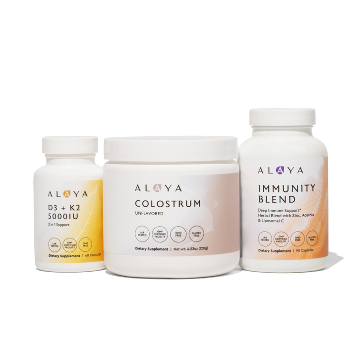 Alaya Colostrum, Immunity Blend and D3+K2 supplement bottles on a white background