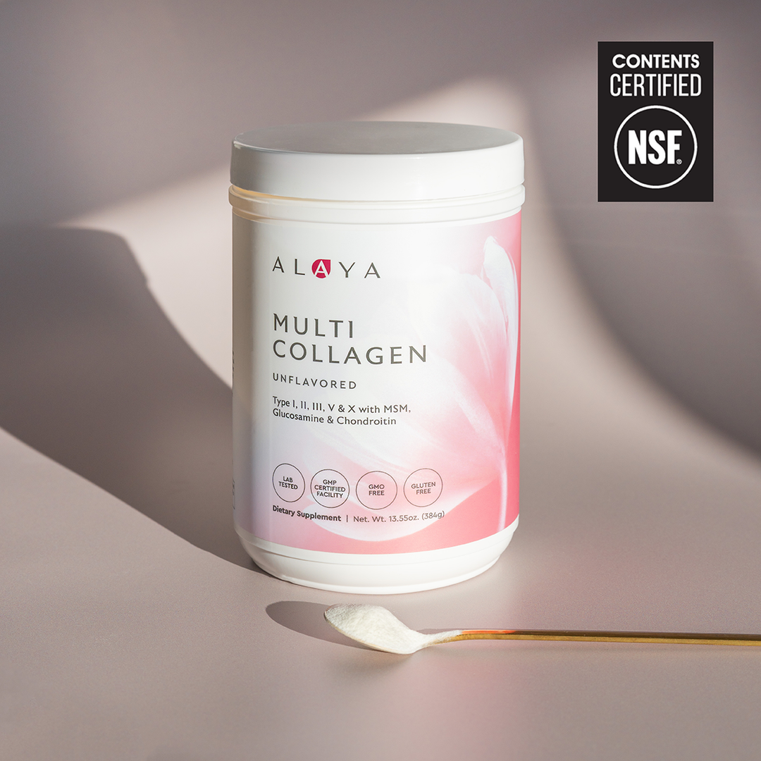 Alaya Multi Collagen Unflavored Powder supplement bottle on a dusty pink background with a gold spoon and powder  #flavor_unflavored