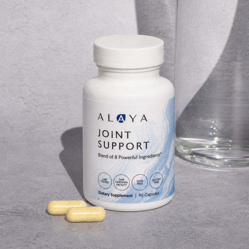 Joint Support on a gray background with a glass of water and 2 capsules